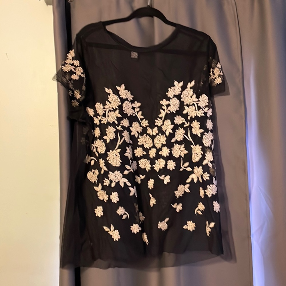 Sheer top with embellishment